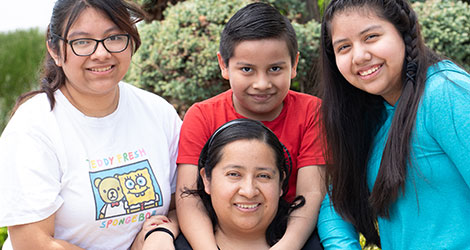 BVMI patient, Alondra, with her 2 daughters and young son.