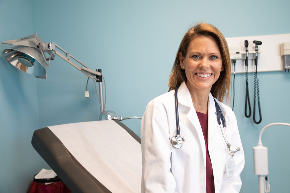 Volunteer doctor Karen Latimer, MD in a BVMI exam room.